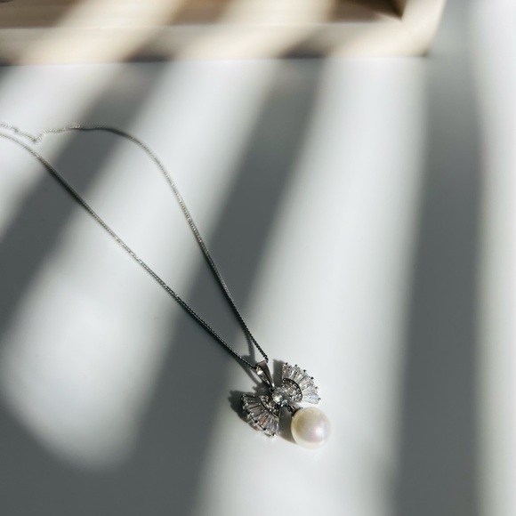 Mallorca Pearl Necklace Platinum Plated Baguette Bow Tie Necklace - Picture 5 of 10